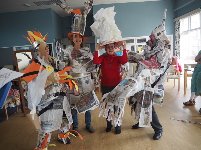 Four people in animal costumes