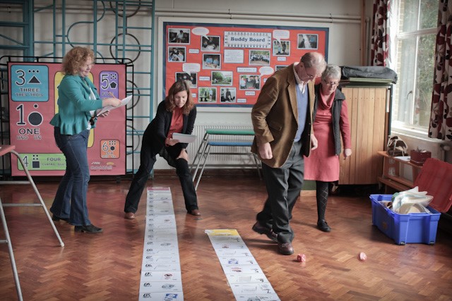 Four people playing a game