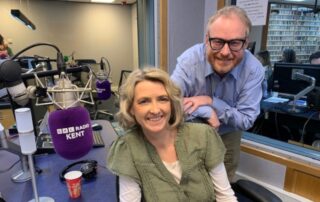 Stevie Rice and Dominic King, smiling at the camera in the BBC Radio Kent studio